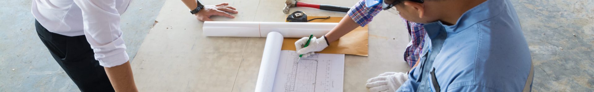 Construction team, Architect, Engineer and Foreman discussing Construction team, Architect, Engineer and Foreman discussing in Building Construction site as Real Estate Project Development Concept